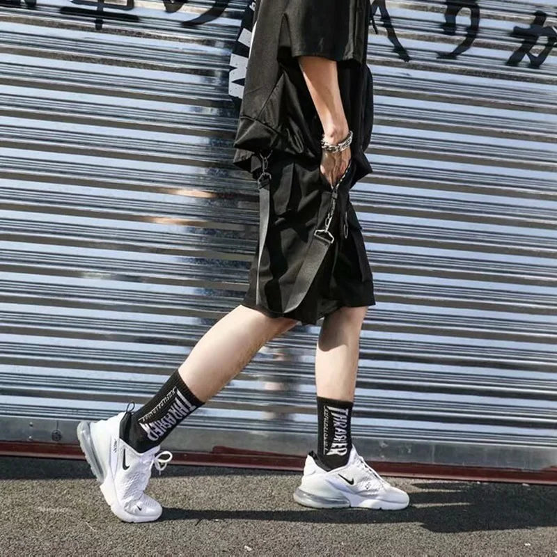 Summer men shorts techwear in Japanese Harajuku fashion style featuring hip hop punk streetwear with cargo and ribbons.