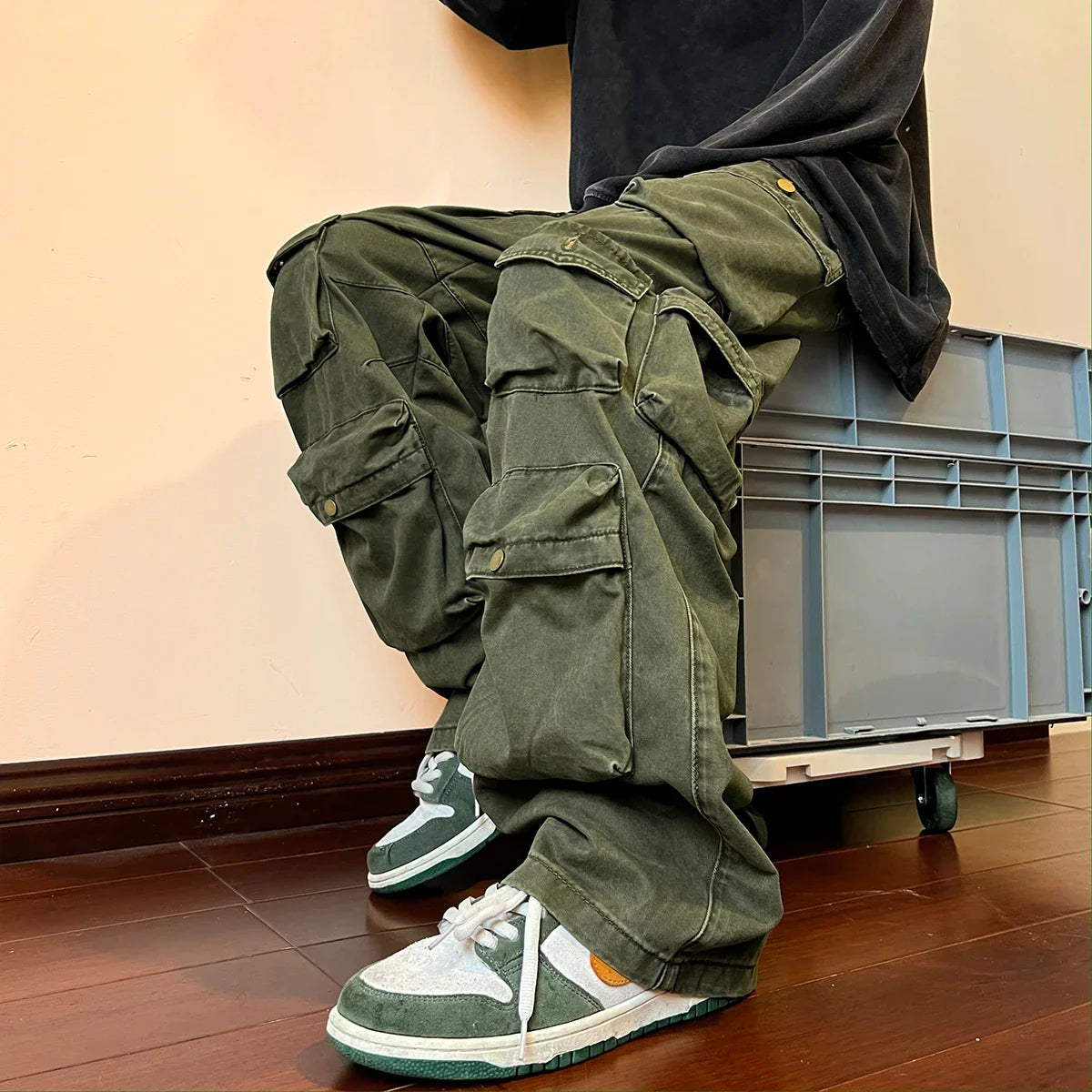 Men's multi-pockets cargo pants in Harajuku streetwear style, casual tooling design, vintage wide leg, midweight fabric.