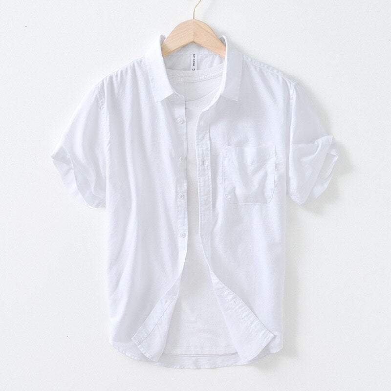 Men's solid color short sleeved casual cotton linen shirt.