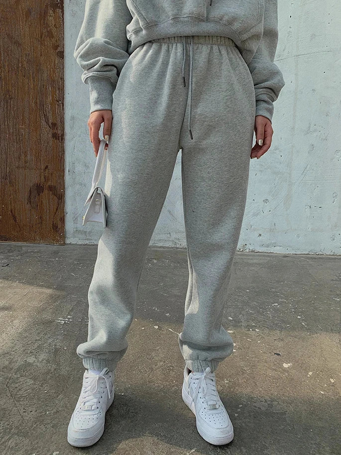 Women's casual grey fleece tracksuit set with hoodie and sweatpants, suitable for autumn and winter sports activities.