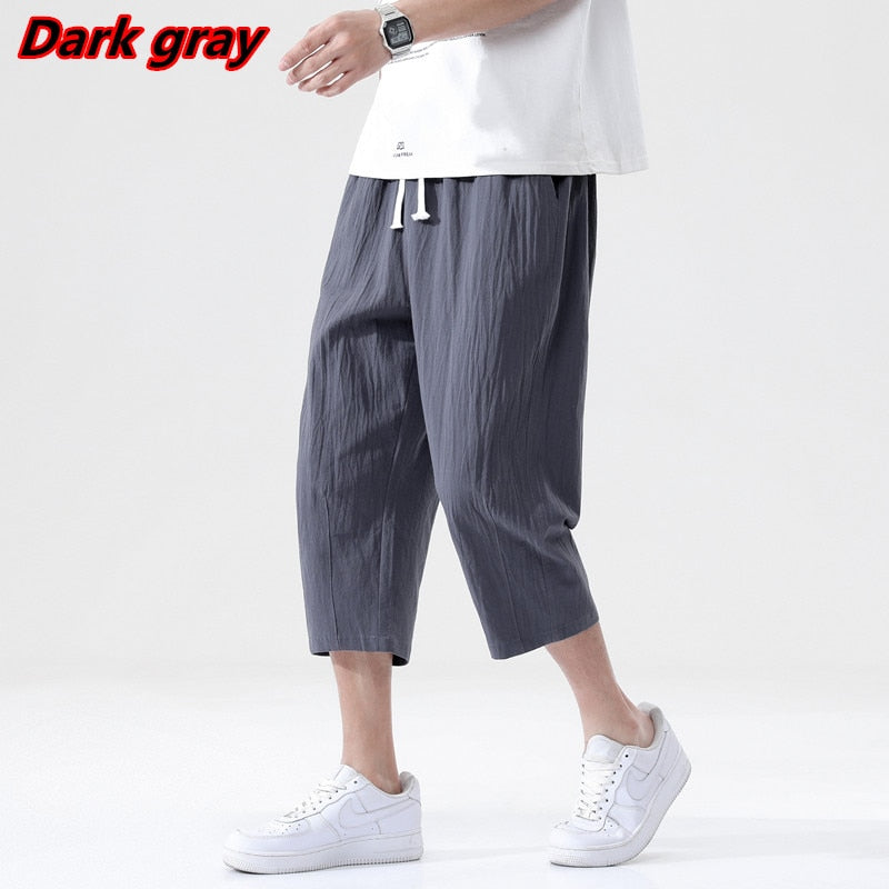 Men's summer casual dark gray linen loose pants with drawstring waist, Korean style.