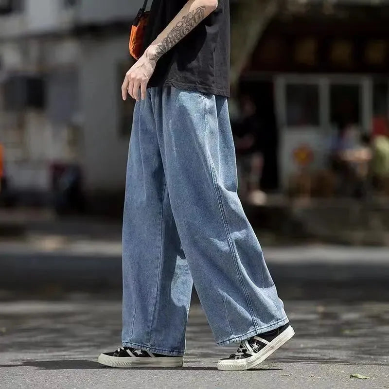 Wide leg denim cargo jeans, loose fit, baggy style, men's hip hop streetwear.