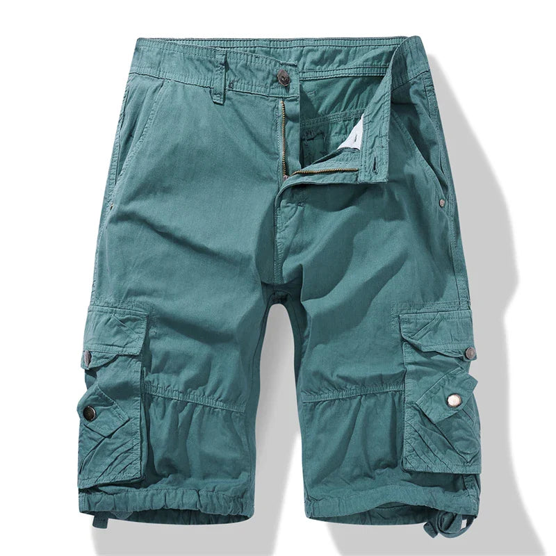 Green military cargo shorts for men, summer casual wear, knee-length with pockets, zipper fly, and regular fit.