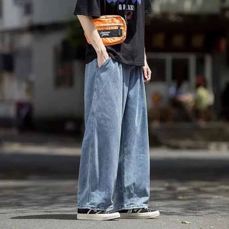 Men's wide leg baggy denim cargo jeans, streetwear style.