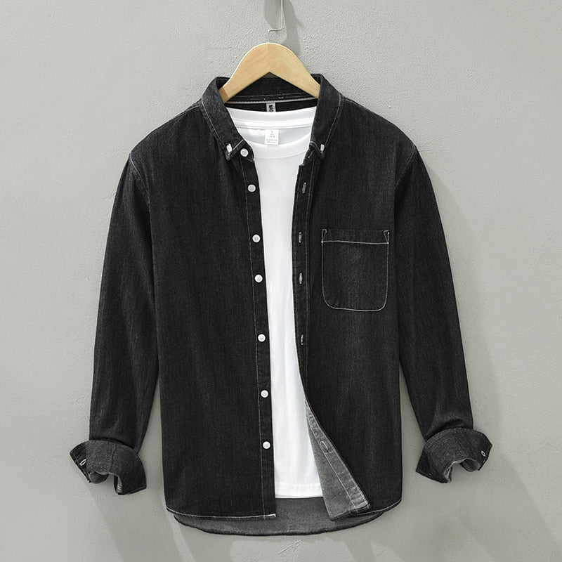 Men's black denim shirt with long sleeves, soft 100% cotton, featuring two pockets and a slim fit, ideal for spring and autumn casual wear.