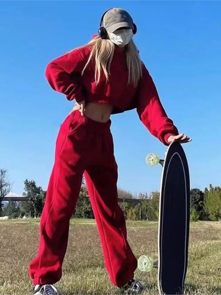 Women's red casual fleece tracksuit set for winter and spring, featuring a hooded sweatshirt and jogger pants, perfect for running and jogging.