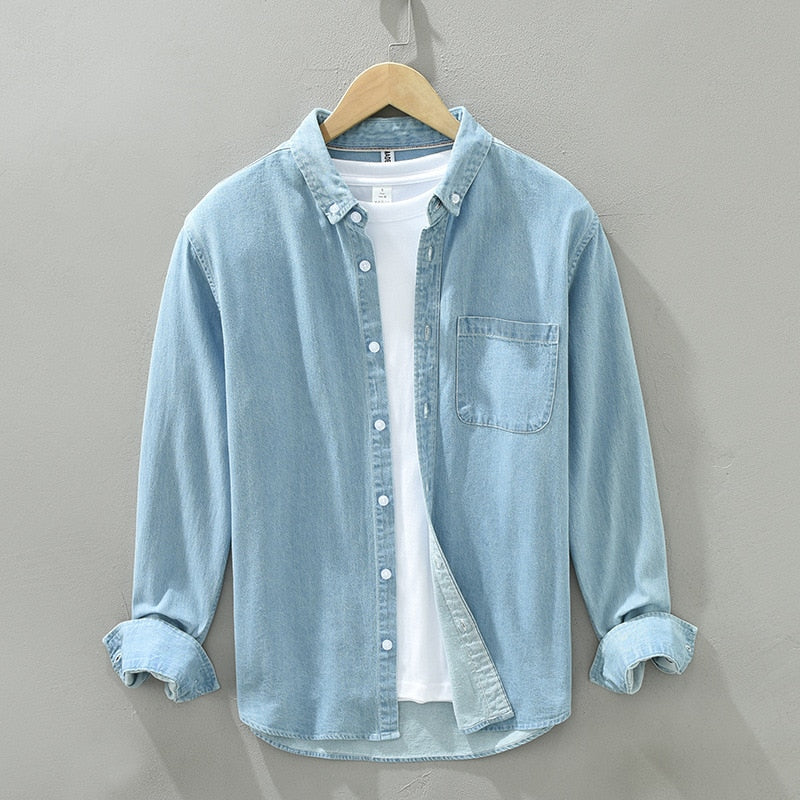 Men's long sleeve denim shirt in light blue, 100% cotton, featuring a turn-down collar and button closure, suitable for spring and autumn casual wear.