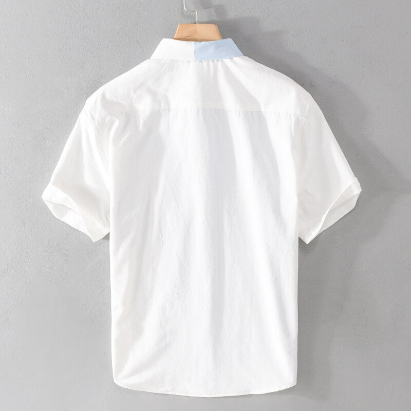 Designer short-sleeve white cotton patchwork shirt with turn-down collar for men.