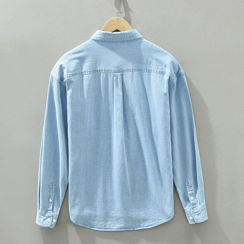 Spring Autumn men's long sleeve denim shirt in light blue, 100% cotton, casual style.