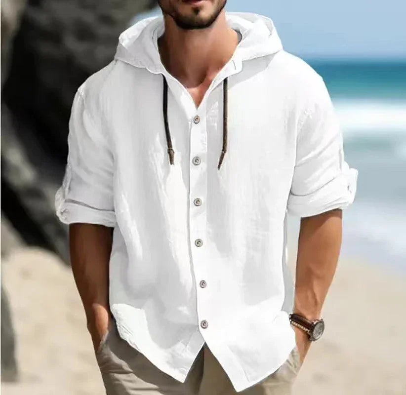 Men's white linen hooded shirt, casual long sleeve, beach background.