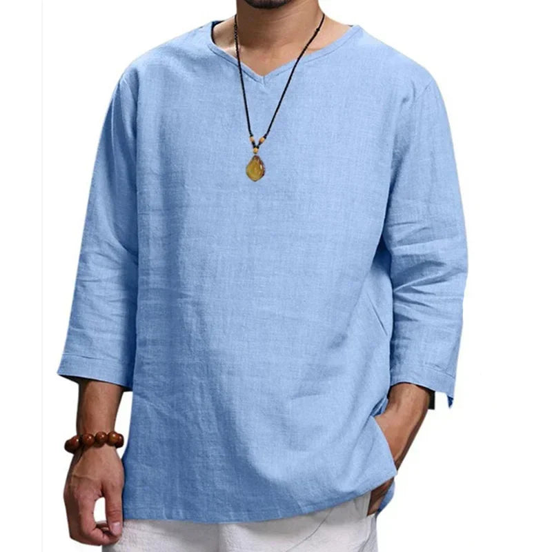 Men's light blue long-sleeved linen shirt with a V-neck design, casual beach style, and comfortable fit for spring and summer.