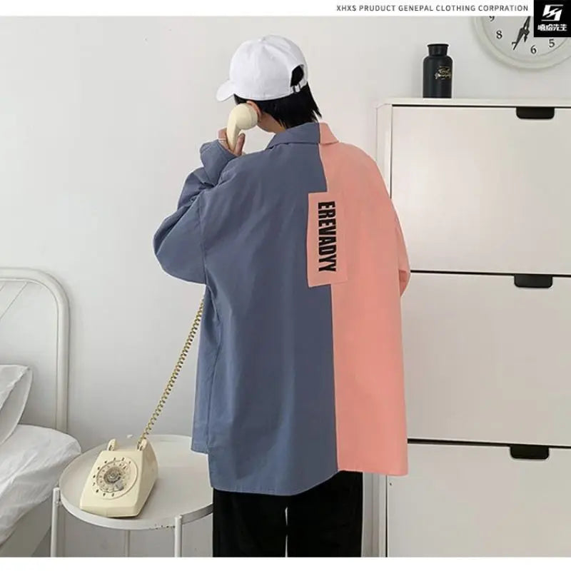 Men's oversized long-sleeved shirt coat with flip collar, letter print, and color block design for autumn leisure.