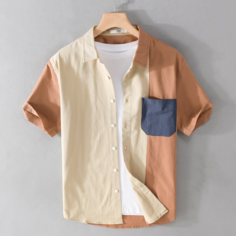 Designer short-sleeve casual patchwork cotton shirt for men, featuring a turn-down collar and regular sleeves.