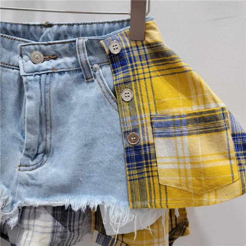 Women's denim skirt with colored plaid patchwork and irregular deconstructed A-line design.