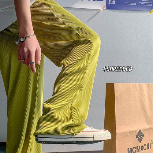 Men's casual loose striped summer pants with elastic waist.