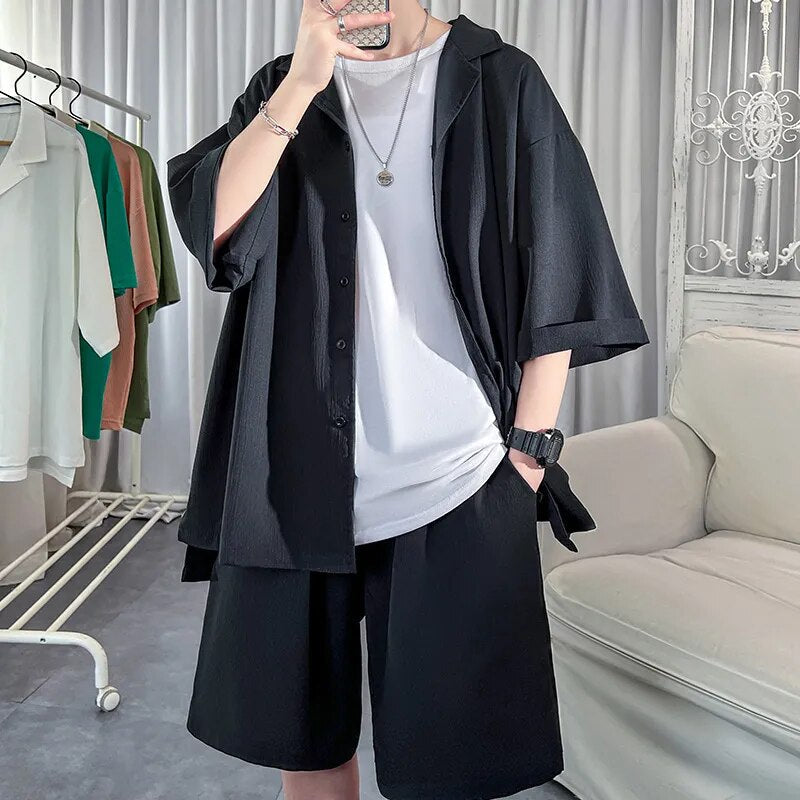 Korean style men's oversized shirt and shorts set in solid black, summer fashion.