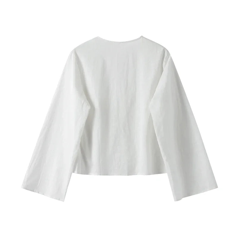 Women's loose hollow out V-neck long sleeve top, white cotton linen fabric, spring 2024 fashion.