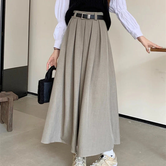 2023 Korean mid-length pleated skirt for women, solid color, versatile A-line style.