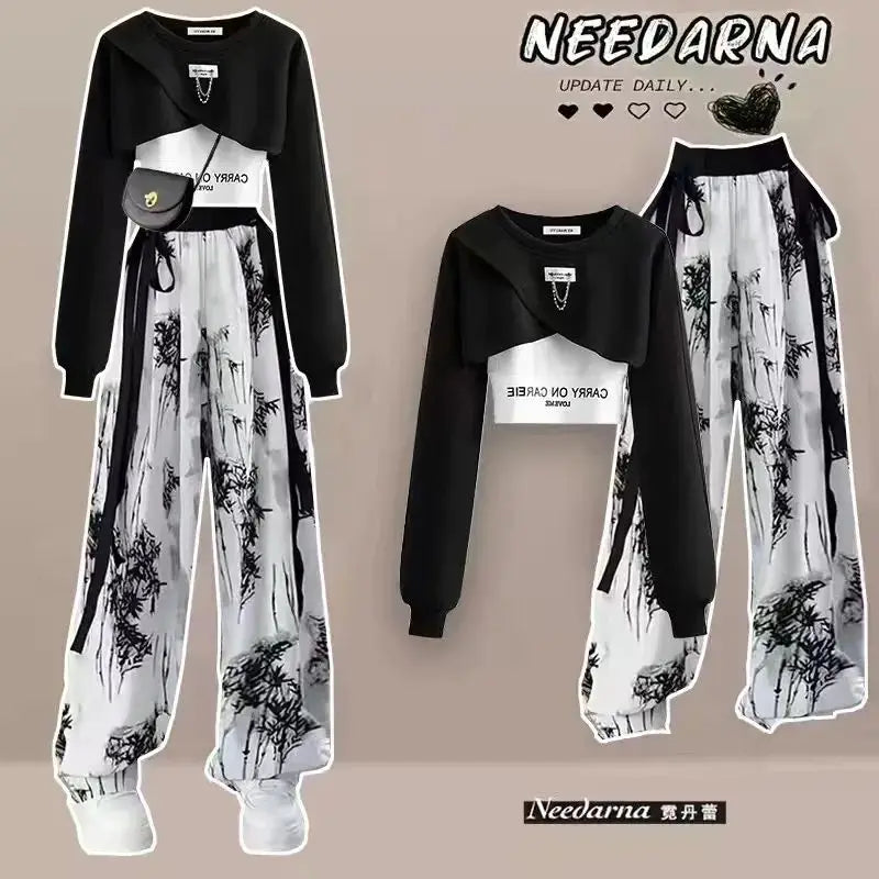 Women's Korean design three-piece set with long-sleeved top, tank top, and ink print wide-legged pants, perfect for spring and autumn fashion.