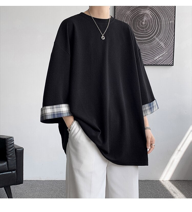 Spring Summer men's oversized plaid T-shirt with three-quarter sleeves, Korean style, casual fit in black and white.