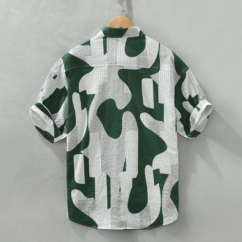 Green and white print short sleeve shirt for men, loose casual summer streetwear.