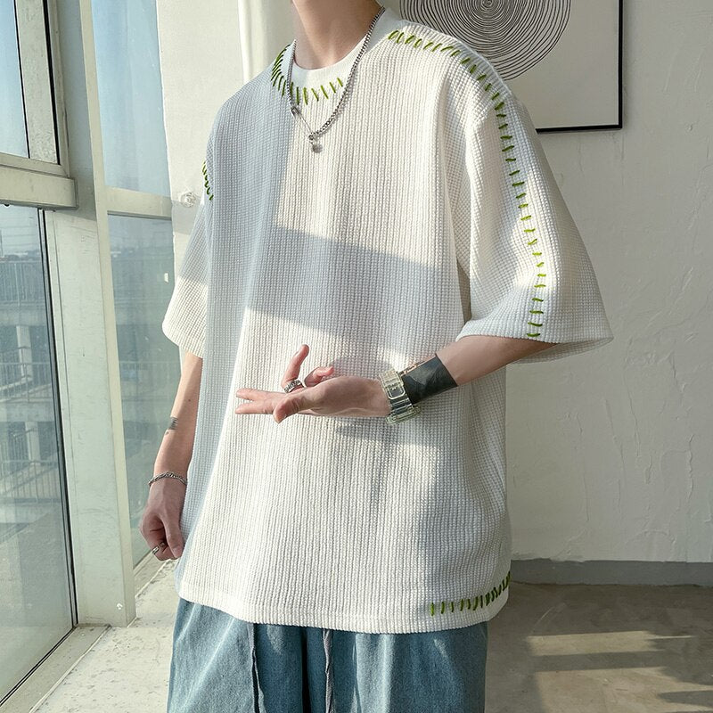 Men's summer casual Harajuku T-shirt with manual suture details and patchwork design, half sleeve, cotton blend fabric.