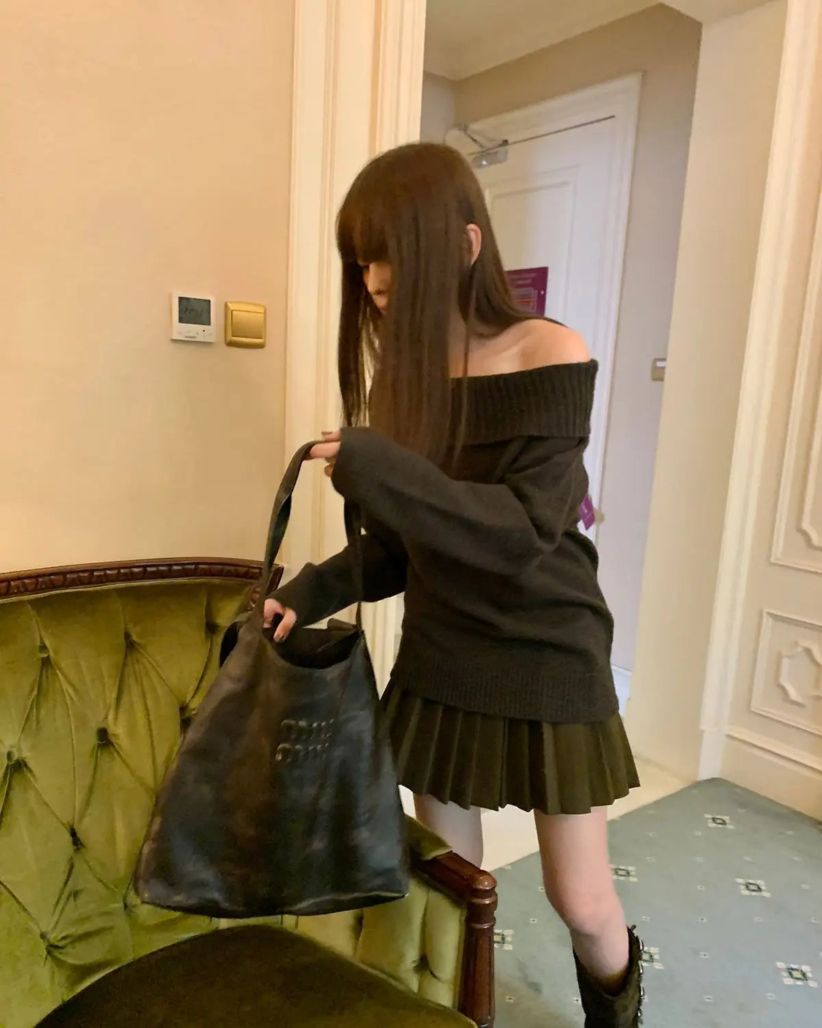 Vintage Japanese style off-shoulder sweater in black, Y2k long sleeve knitwear with slash neck, casual Harajuku fashion.