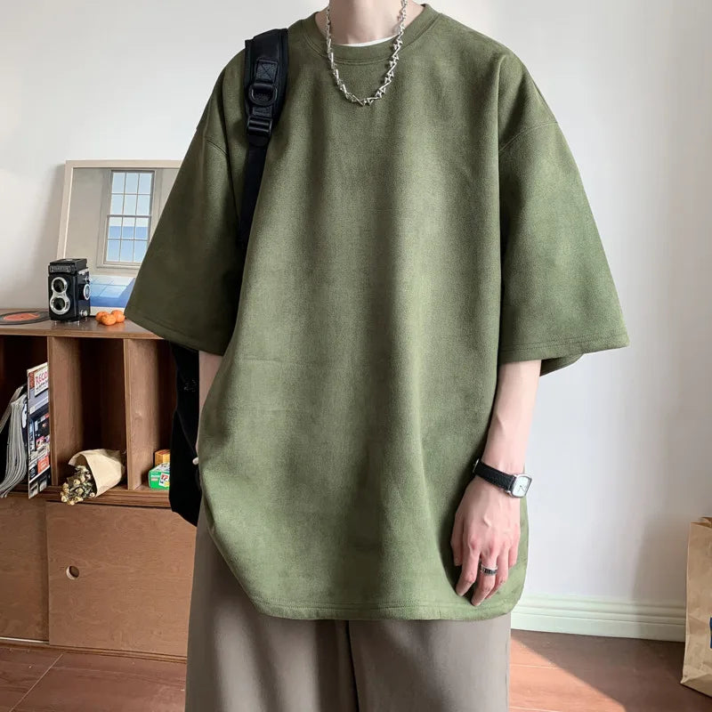 Men's olive green loose short-sleeved suede t-shirt, casual summer streetwear with a round neck design.