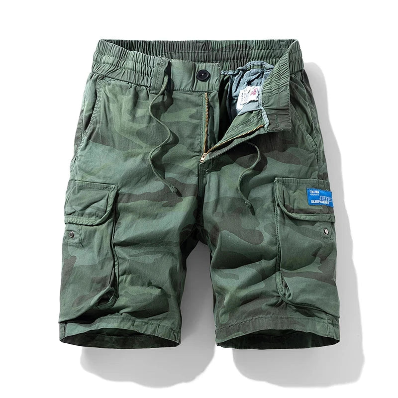 Men's casual green camouflage shorts, military cargo style, cotton knit fabric, oversized fit with zipper fly.