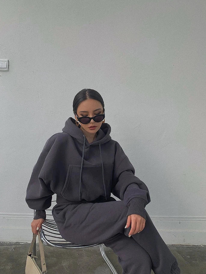 Women's casual solid fleece tracksuit with hoodie and sweatpants, winter spring outfit.