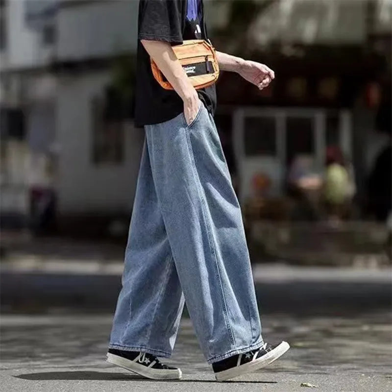 Men's wide leg denim cargo jeans, loose straight baggy streetwear.