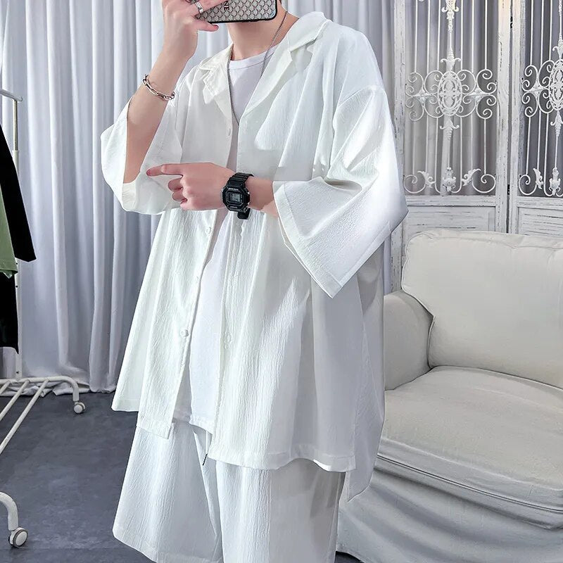 Korean style men's oversized summer set with short sleeve shirt and matching shorts.