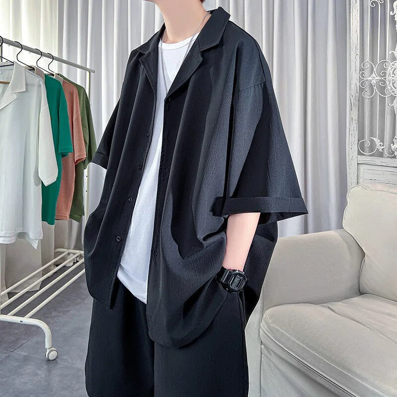 Korean style men's oversized black shirt and shorts set, summer fashion.