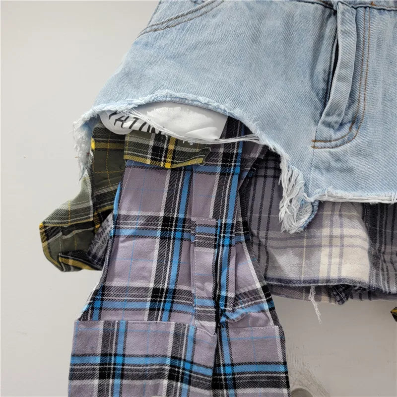 Denim skirt with colored plaid patchwork, irregular deconstructed design, high waist mini A-line style.