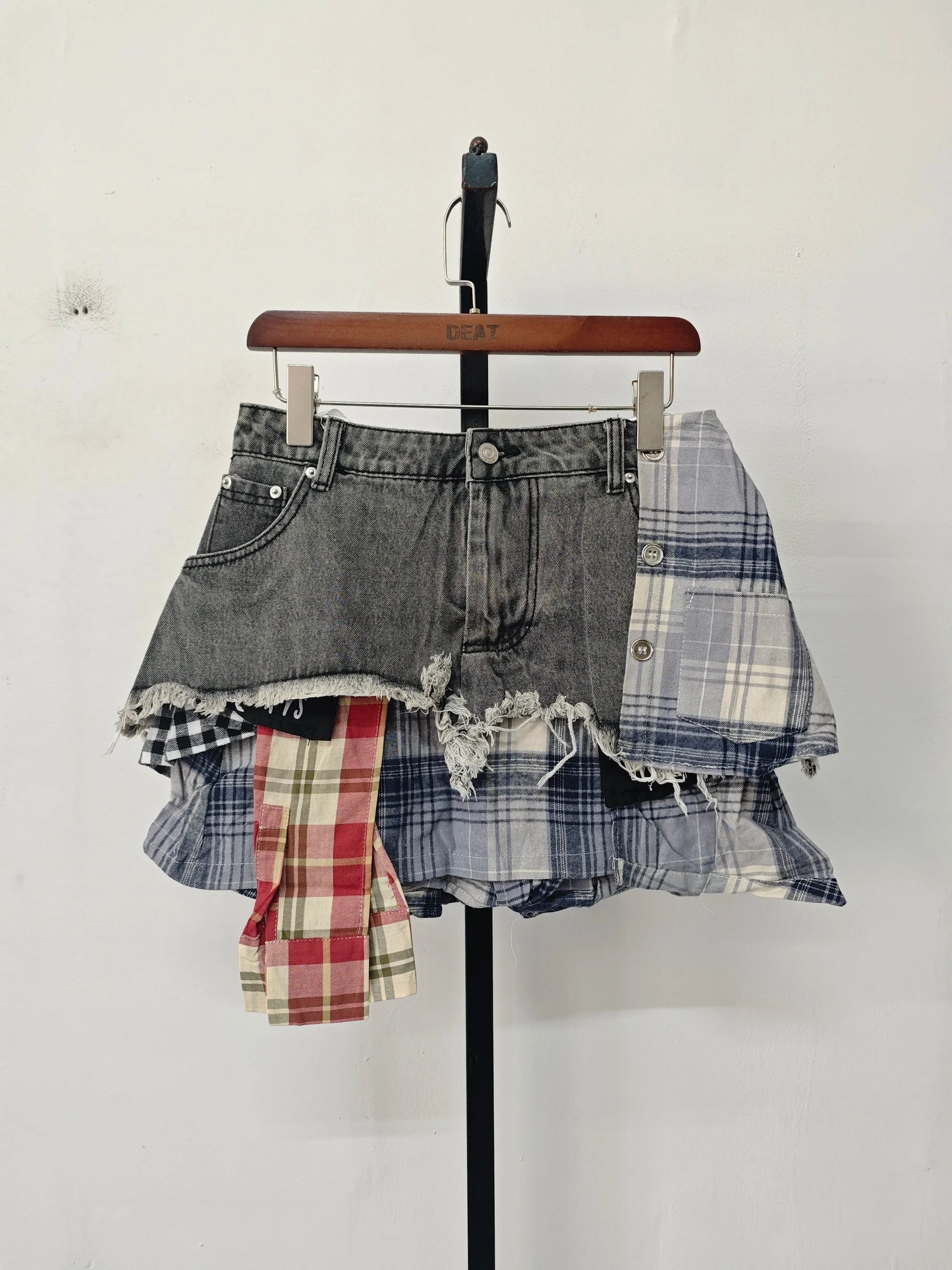 DEAT women's denim skirt with colored plaid patchwork and irregular deconstructed A-line design, high waist mini skirt for summer fashion.