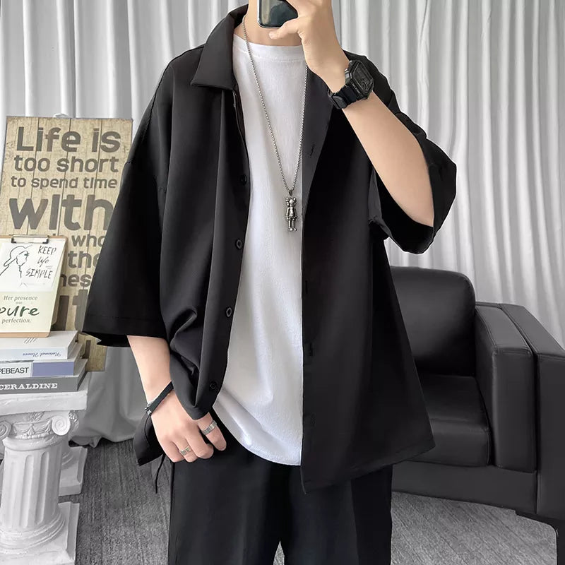 Oversized men's solid color Harajuku casual half sleeve shirt, ideal for cool summer streetwear.