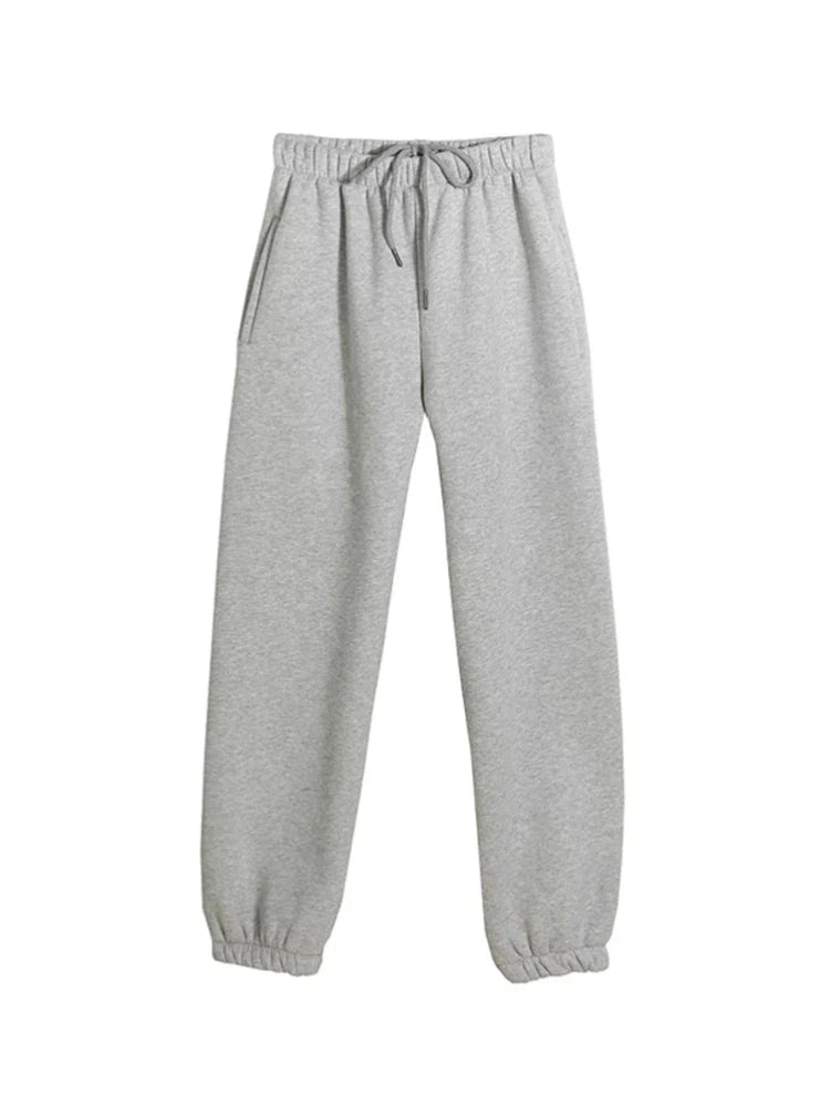 Women's fleece sweatpants, solid gray, casual tracksuit, elastic waist, pockets, comfortable winter wear.