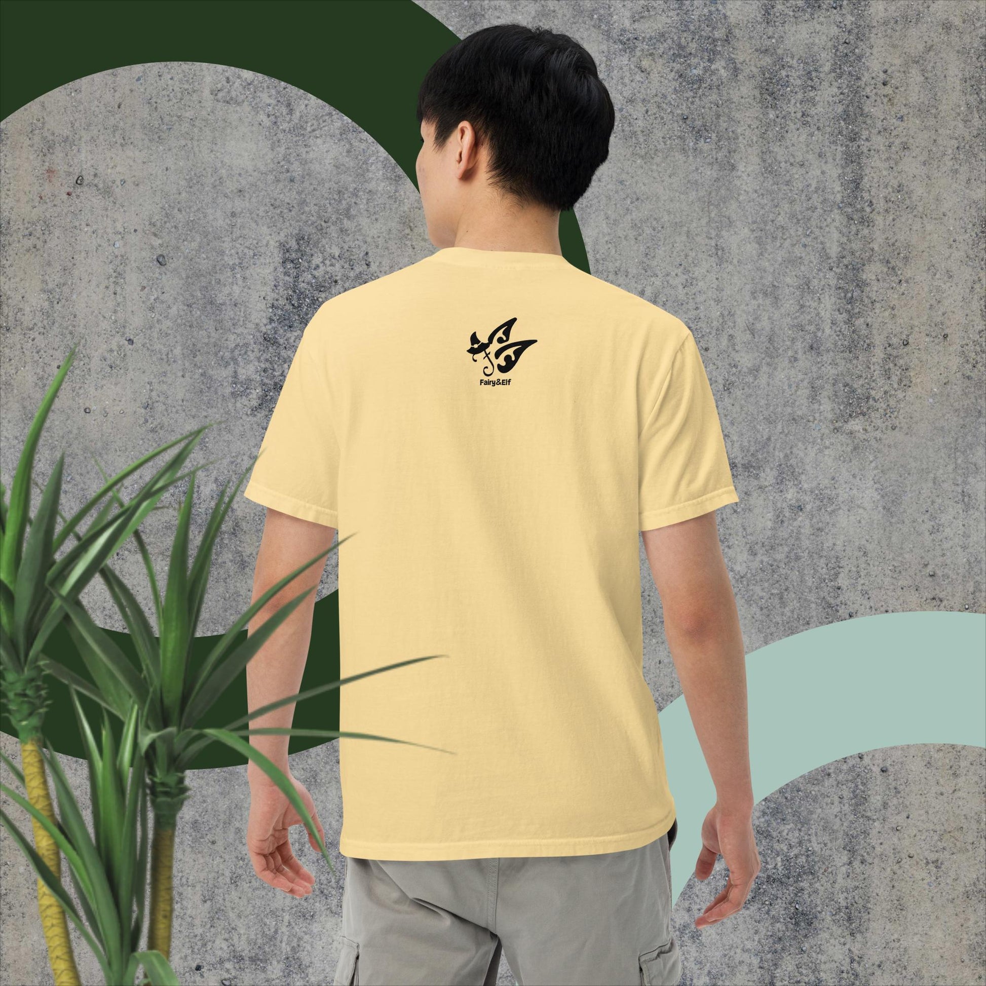 Unisex T1604 garment-dyed heavyweight t-shirt in pale yellow, featuring breathable 100% ring-spun cotton and relaxed fit.