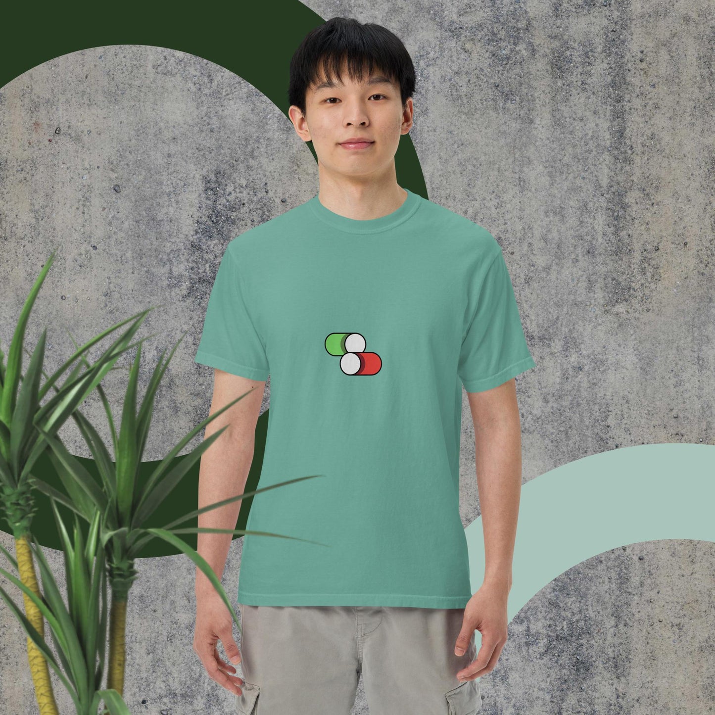 Switch Man garment-dyed heavyweight t-shirt worn by model in green setting.