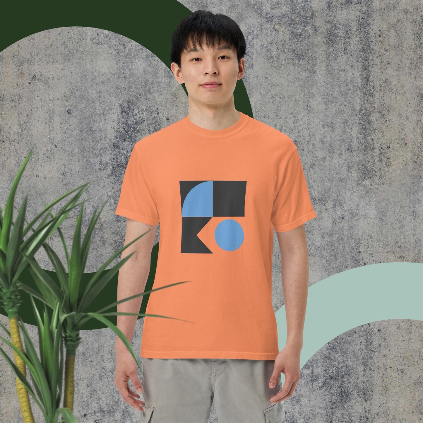 Unisex T1604 garment-dyed heavyweight t-shirt in orange with abstract geometric design, made of 100% ring-spun cotton for a soft and breathable feel.