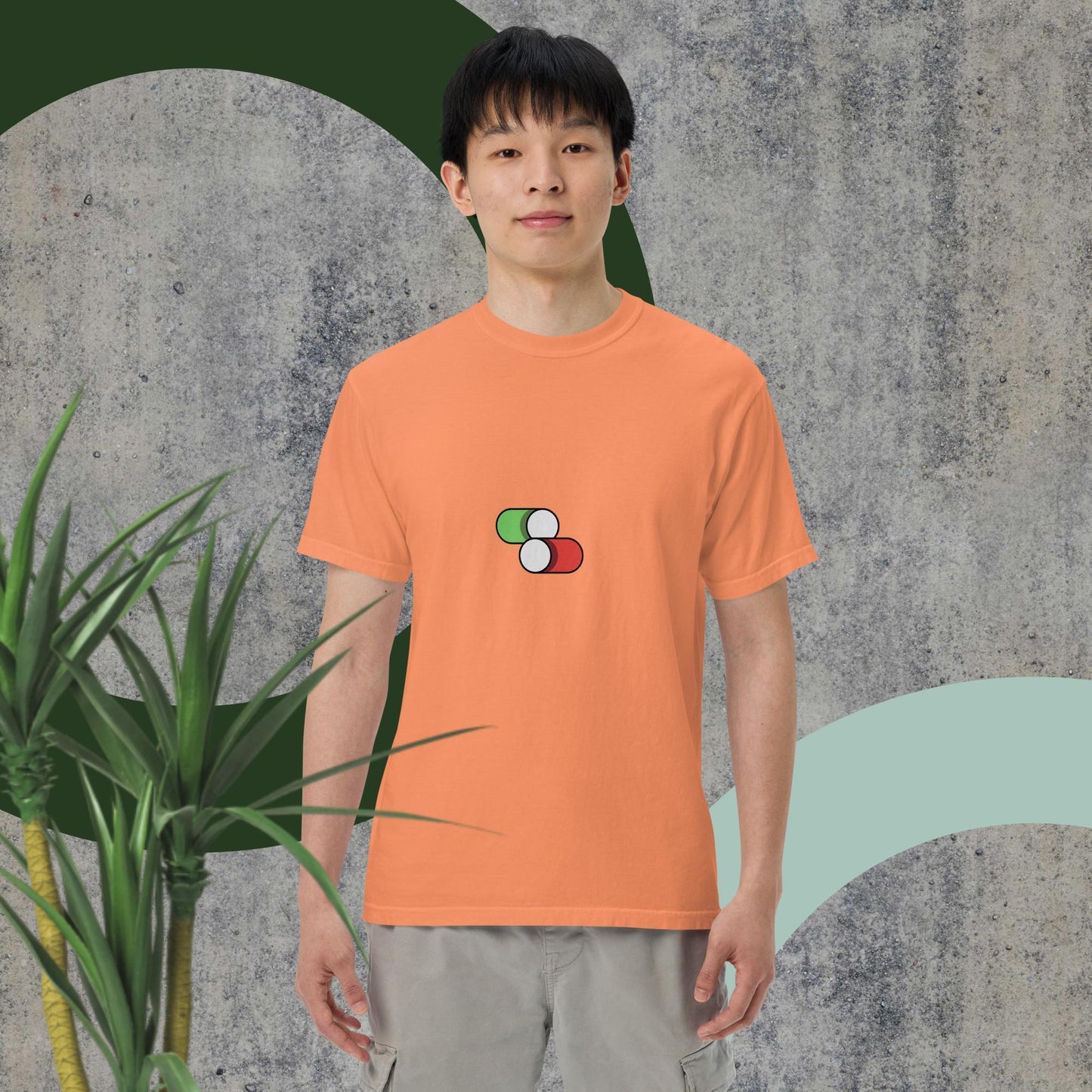 Switch Man garment-dyed heavyweight t-shirt in orange with button graphic design.