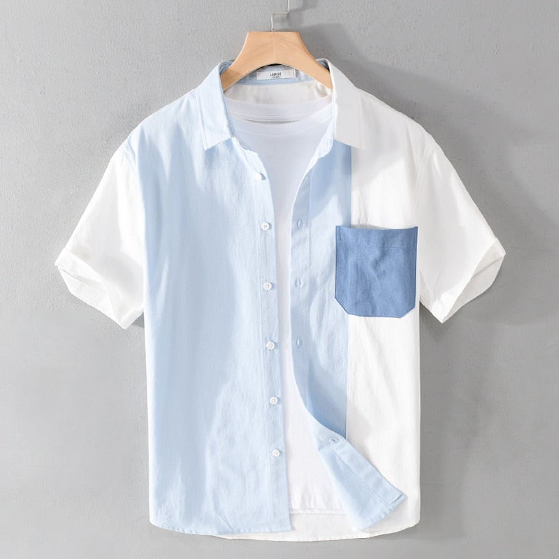 Designer short-sleeve casual patchwork cotton brand shirt for men on hanger.